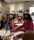 Good Start Toolooa Street school holiday group students creating their portraits at the Gladstone Regional Art Gallery & Museum, 2018 Photograph: J Dyson